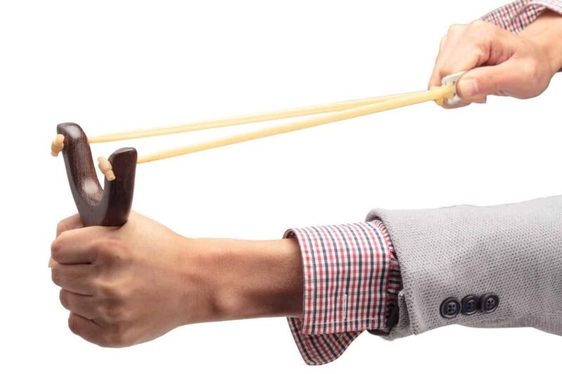 Paracord factory: Multi-colored cords on a black background.