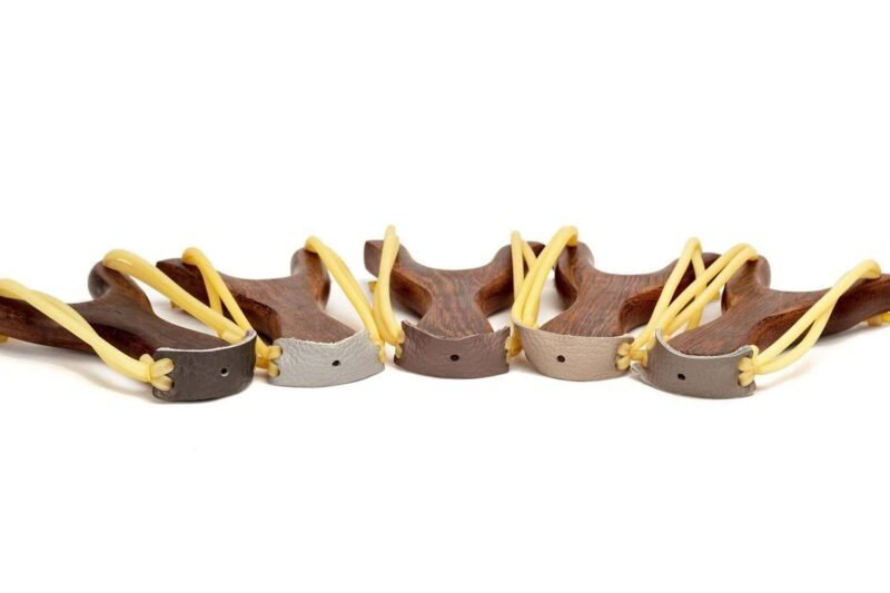 Paracord factory: Multi-colored cords on a black background.